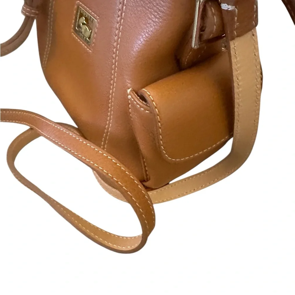 Dooney & Bourke Pebbled Grain Pocket Sac Crossbody with Side Pockets.